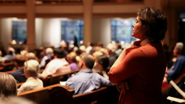 Rev. Dawn Bennett, a Pastor at The Table, attends a community vigil held at Belmont United Methodist Church after a deadly shooting at the Covenant School in Nashville