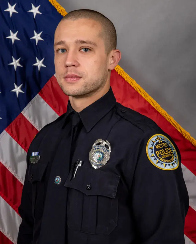 Photo of police officer who shot at armed suspect.