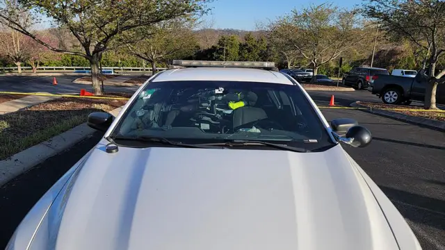 A handout photo made available by the Metro Nashville Police Department showing bullet hits in an arriving police vehicle