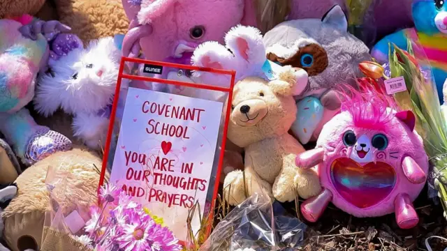 A makeshift memorial grows at the entrance to the Covenant Presbyterian Church school shooting site in Nashville, Tennessee