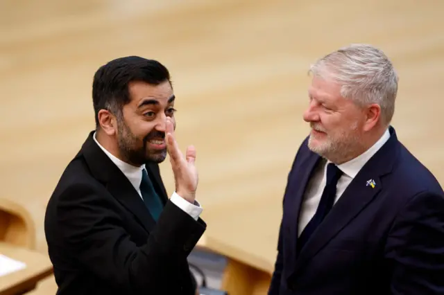 Yousaf and Angus Robertson