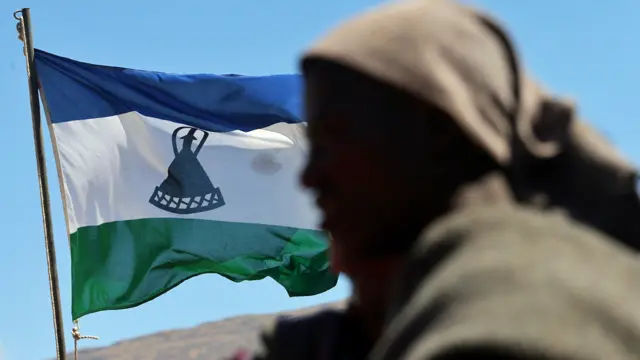 A boy in front of the Lesotho flag - 2013 (Archive shot)