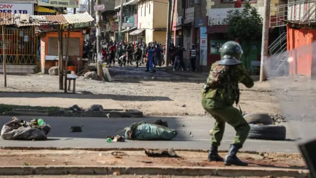 An anti-riot police fires towards the protestors during a demonstration called by Azimio party leader Raila Odinga over the cost of living and president William Ruto's administration