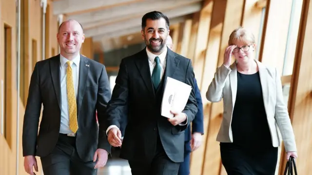 Humza Yousaf flanked by Neil Gray and Shona Robison