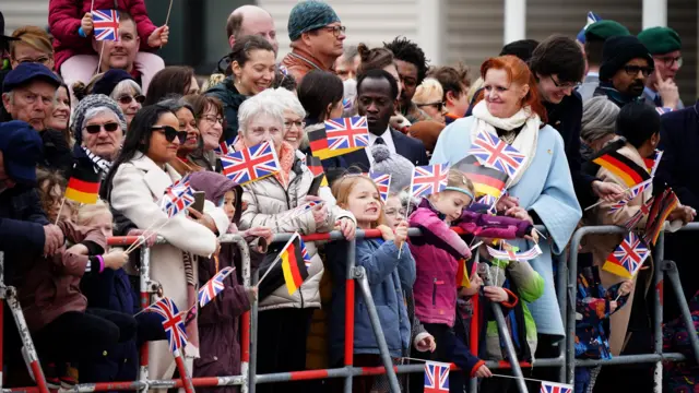 Crowds wave German and Union flags in Berlin