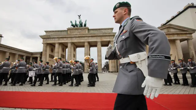 Military personnel prepare for King Charles's arrival