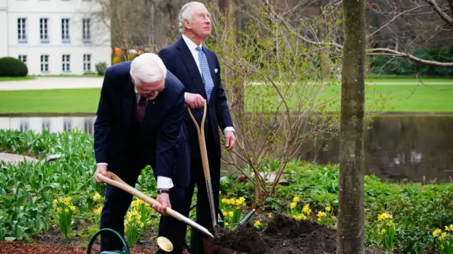 King Charles III and German President Frank-Walter Steinmeier in the garden of the presidential palace