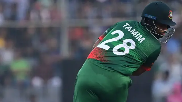 Tamim Iqbal is hit in the chest by a Mark Wood bouncer