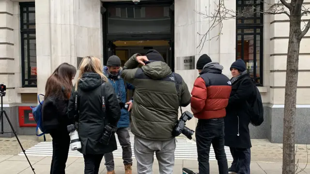 Reporters outside Wogan House