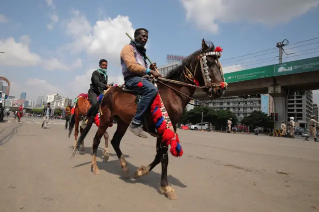 Celerants on horseback.