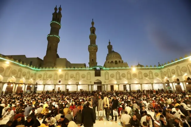 People breaking their fast at mosque