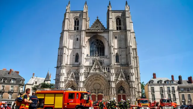 Firefighters at work at the Cathedral of St Peter and St Paul in Nantes, 18 July 2020