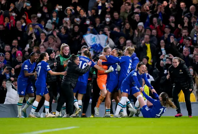 Chelsea players celebrate with Ann-Katrin Berger