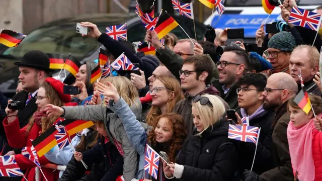 Crowds in Berlin await the arrival of the King and Queen Consort on Wednesday