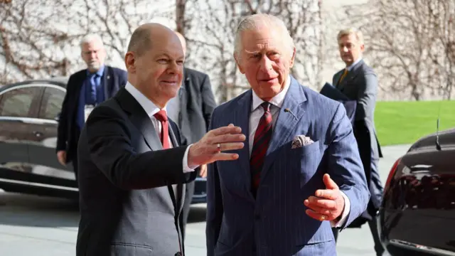 The King and Chancellor Olaf Scholz