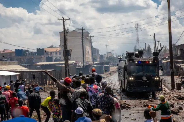 Anti-riot police officers use water cannons to disperse supporters and leaders of the Azimio la Umoja coalition during a mass demonstration called by the Opposition leader Raila Odinga at Kawangware Slum on March 27, 2023 in Nairobi, Kenya.