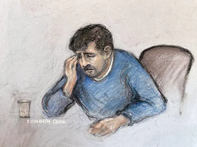 A court sketch shows Thomas Cashman wiping away tears as he was convicted earlier today