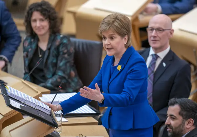 Nicola Sturgeon at her final FMQs, with her binder of briefings in front of her