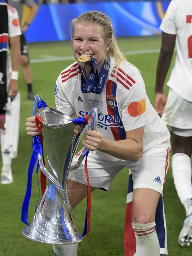 Ada Hegerberg with Champions League trophy