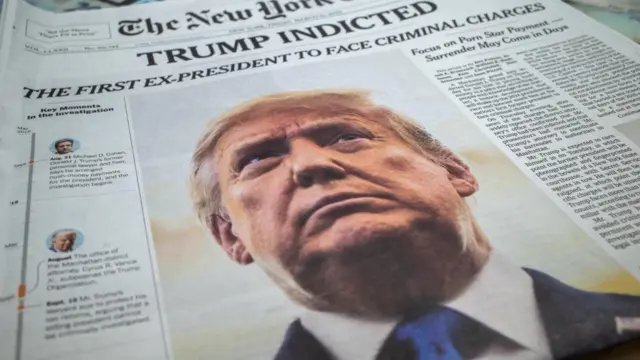 A New York Times newspaper is displayed at a newsstand following former U.S. President Donald Trump's indictment by a Manhattan grand jury following a probe into hush money paid to porn star Stormy Daniels, in New York City, U.S. March 31, 2023