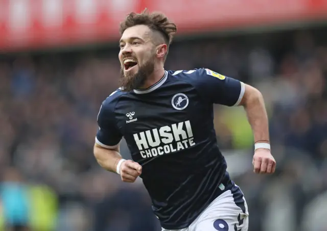 Tom Bradshaw celebrates