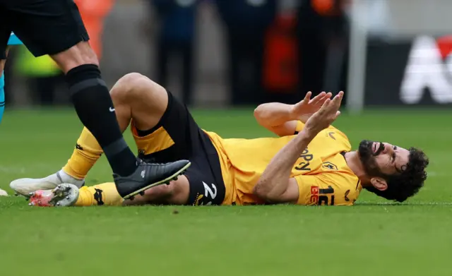 Wolves striker Diego Costa in pain after awkward fall