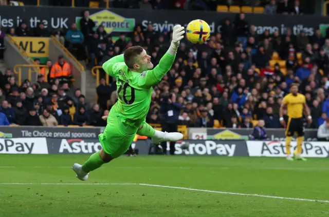 Tottenham goalkeeper Fraser Forster makes a diving save