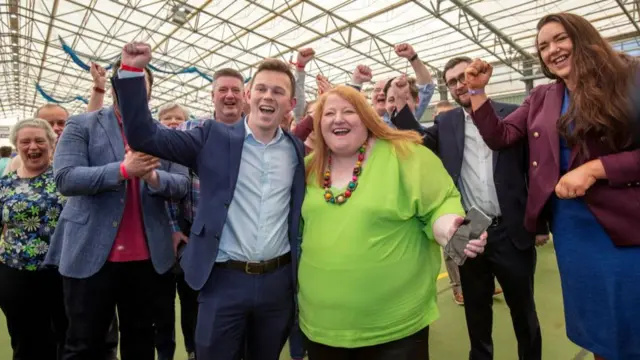 Alliance Party members celebrate their success in the Northern Ireland Assembly election in May 2022