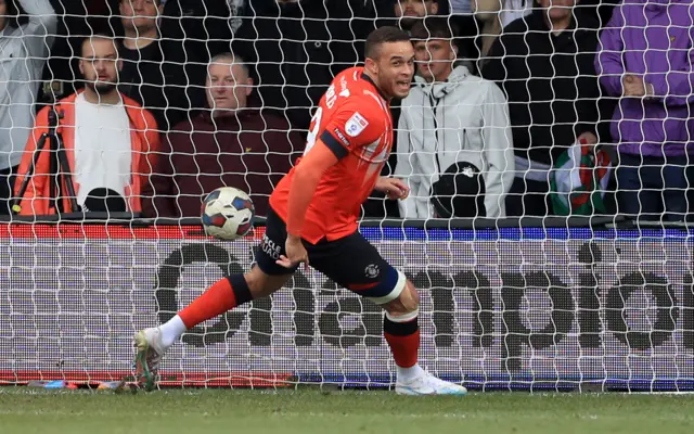 Carlton Morris celebrates scoring for Luton