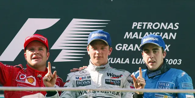 Fernando Alonso on the podium in Malaysia in 2003