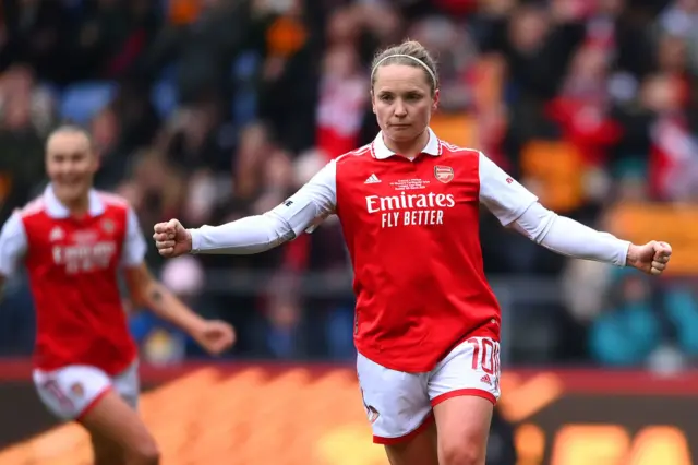 Kim Little of Arsenal celebrates after scoring against Chelsea