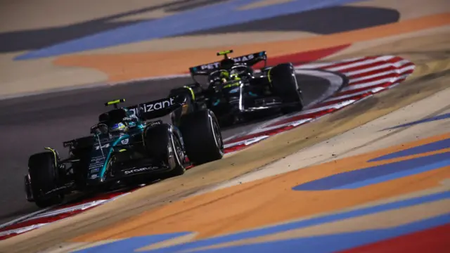 Fernando Alonso leading Lewis Hamilton