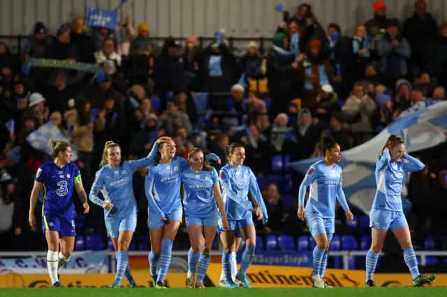 Man City celebrate against Chelsea in 2022 League Cup final