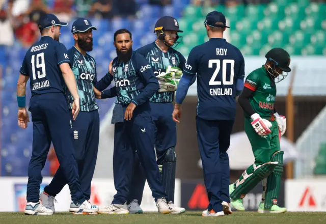 Adil Rashid celebrates the wicket of Mahmudullah