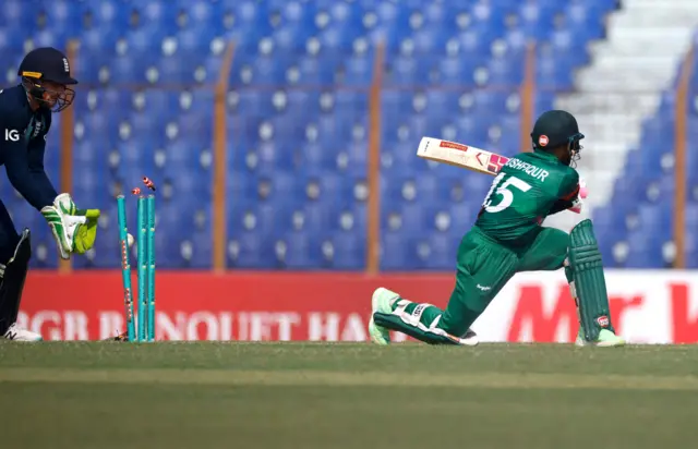 Bangladesh's Mushfiqur Rahim is bowled by England's Adil Rashid