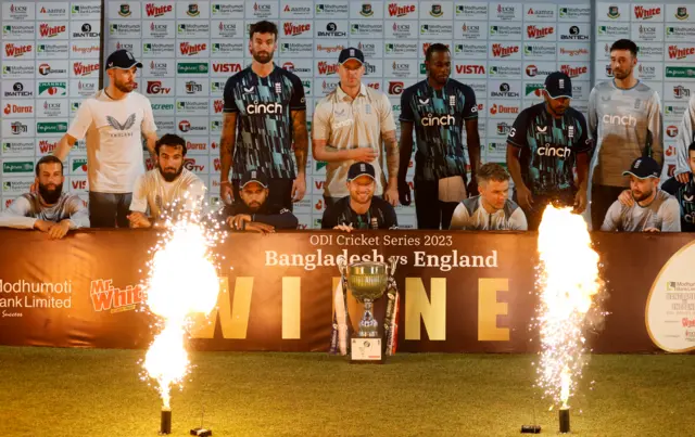 England celebrate with the trophy after beating Bangladesh in the ODI series