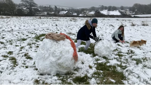 A snowman under construction in Llantwit Major