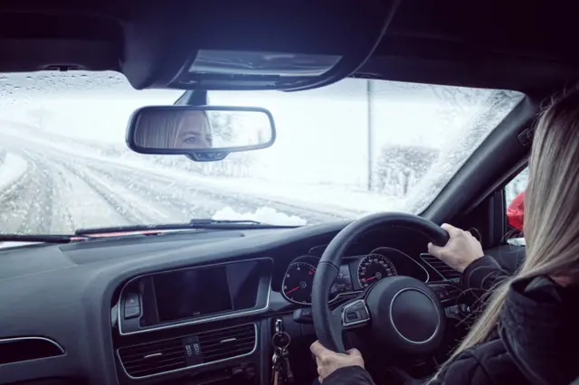 Car being driven in snow