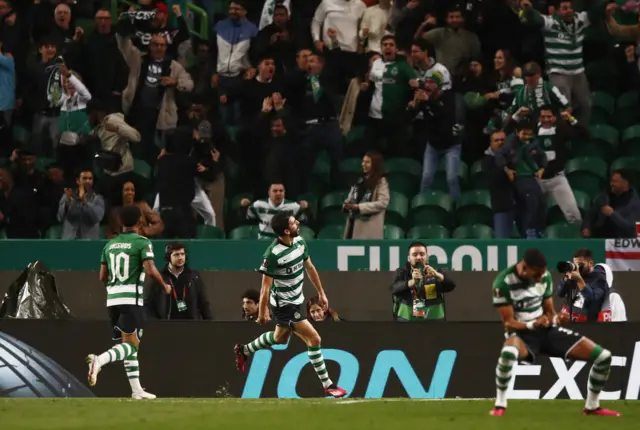 Paulinho celebrates scoring