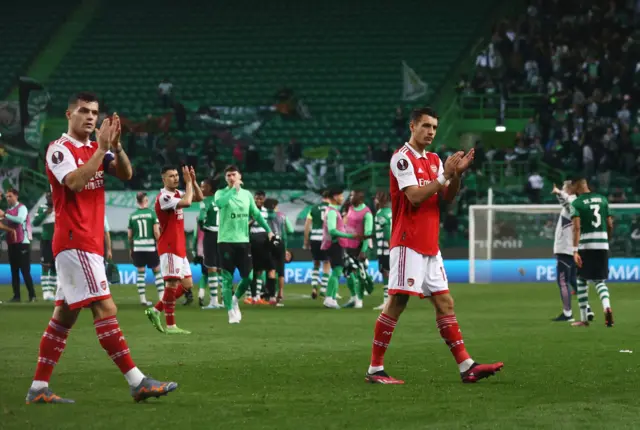 Granit Xhaka and Jakub Kiwior applaud the Arsenal fans