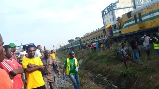 People looking at crash site