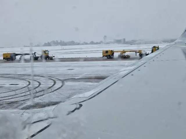 Snow on the runway at Birmingham Airport