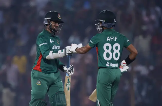 Bangladesh's Shakib Al Hasan and Afif Hossain celebrate after winning the match