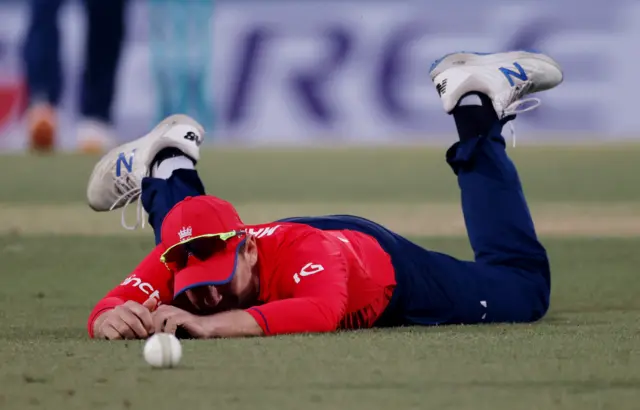 Dawid Malan reacts after dropping Afif Hossain