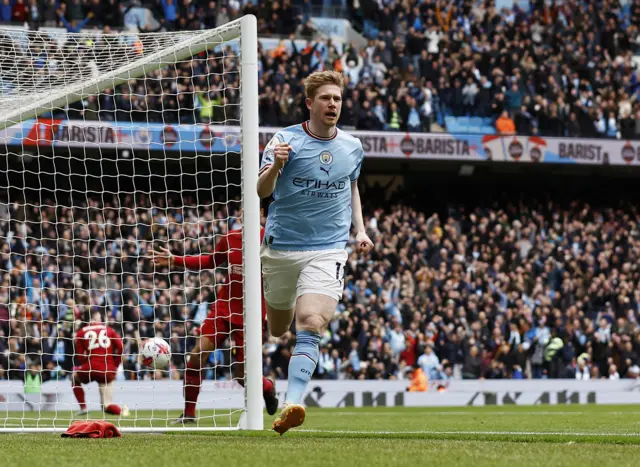 Kevin de Bruyne celebrates putting Man City ahead v Liverpool.