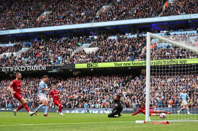 Julian Alvarez equalises for Man City v Liverpool.