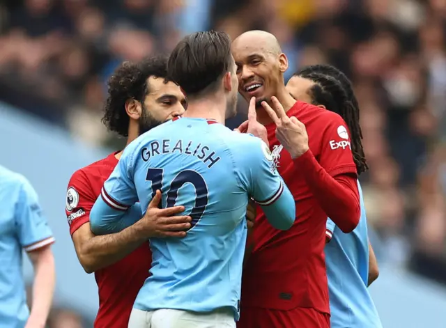 Jack Grealish and Fabinho square up after a coming together.