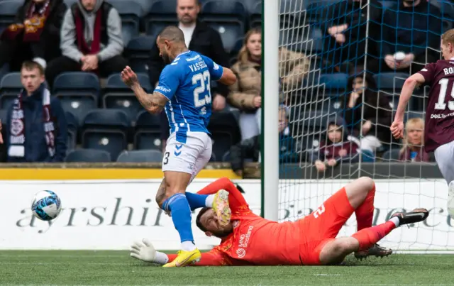 Kyle Vassell is fouled by Zander Clark