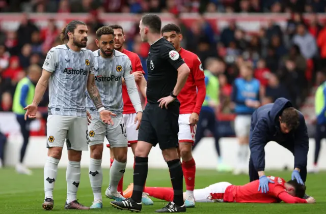 Ruben Neves of Wolverhampton Wanderers complains to Referee Chris Kavanagh during the Premier League match between Nottingham Forest and Wolverhampton Wanderers