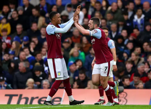 John McGinn of Aston Villa celebrates with teammate Ezri Konsa